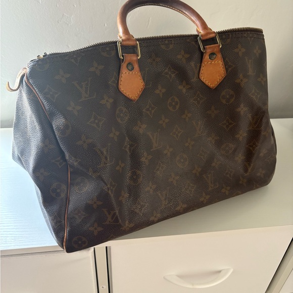 Louis Vuitton Classic Monogram Duffel in Brown and Tan - Picture 1 of 5